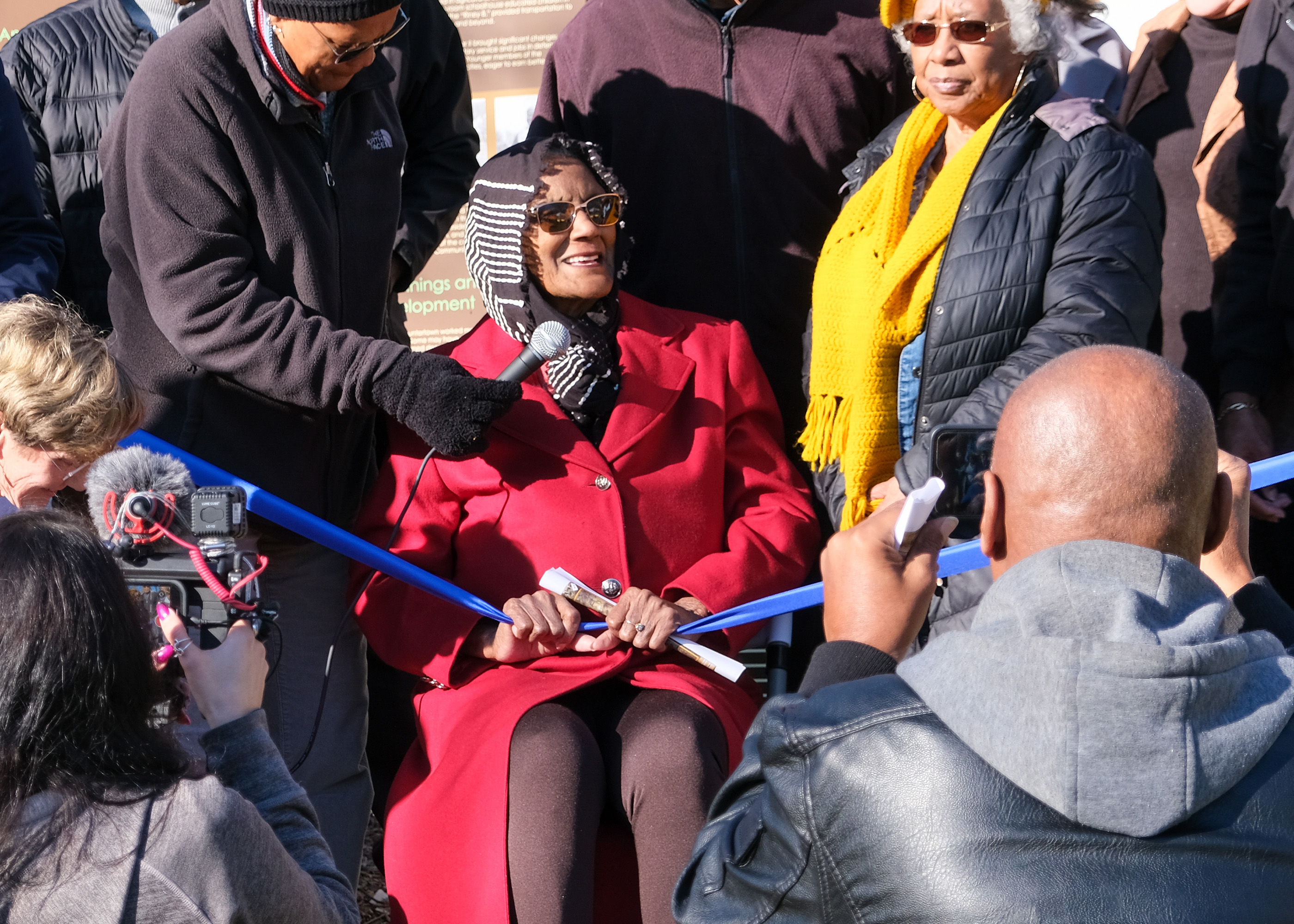 Photograph of ribbon cutting at the HCIP signage and bioswale dedication